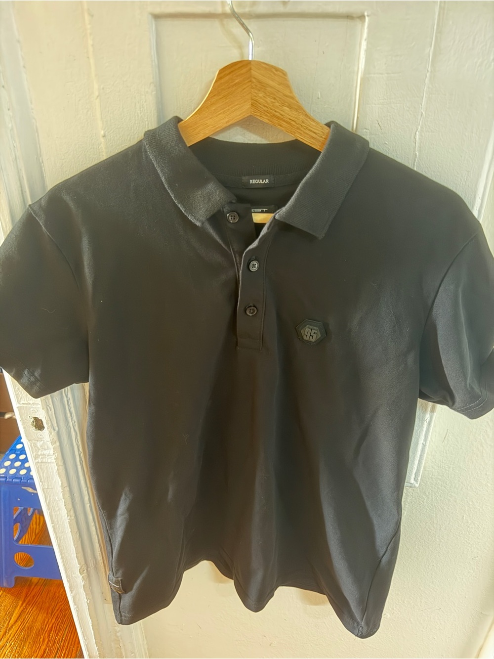 Men's Black Short-Sleeve Polo with Subtle Chest Badge
